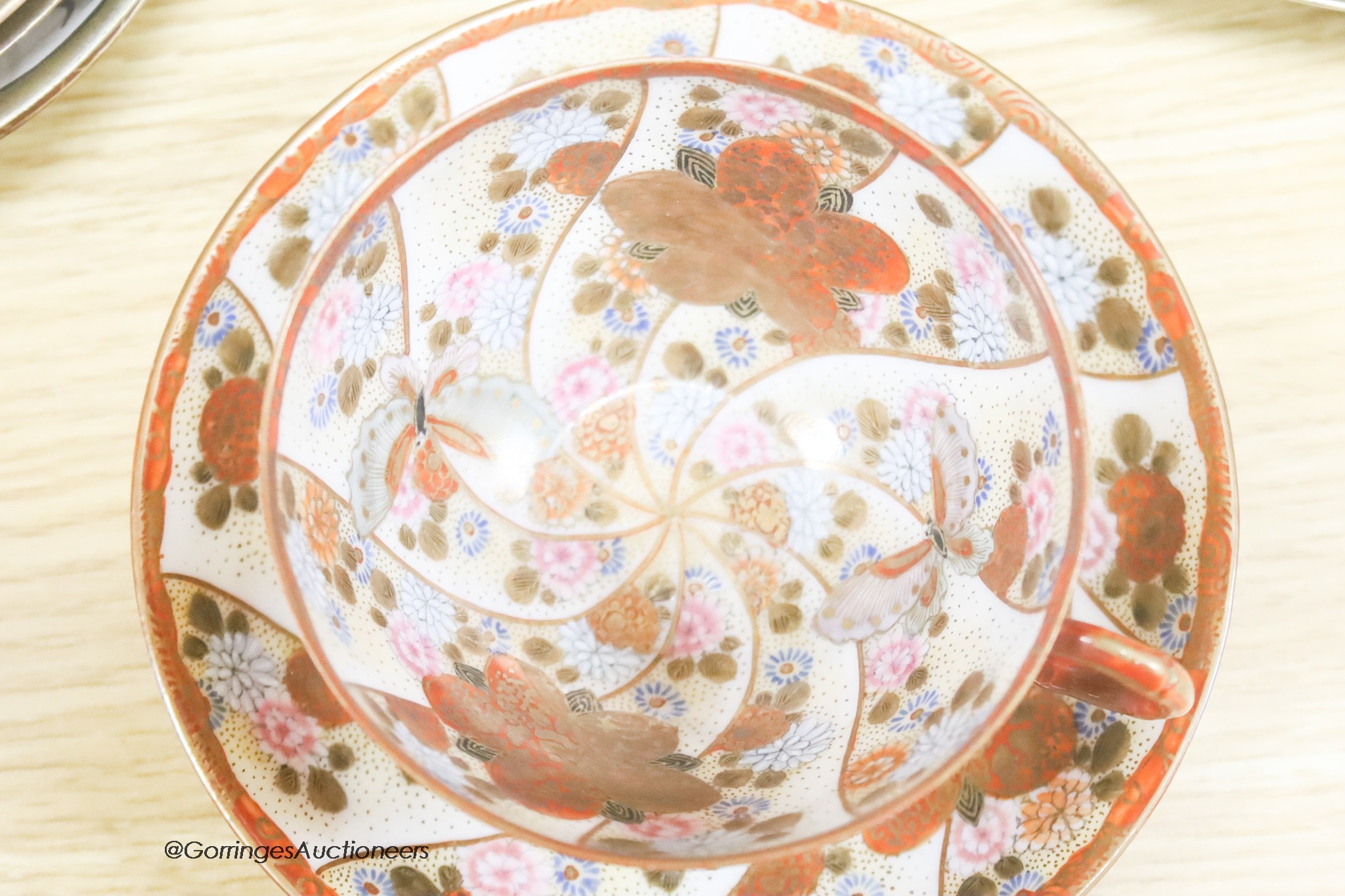 A group of various Japanese Meiji period cup and saucers